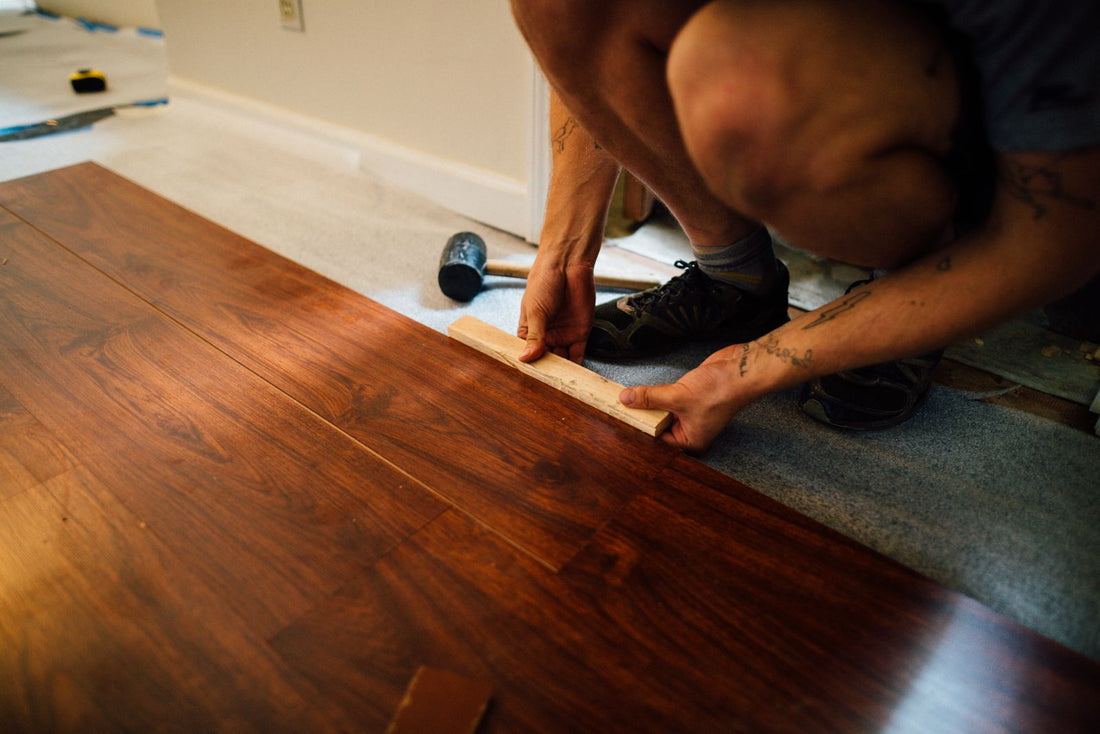 Professional installing laminate flooring