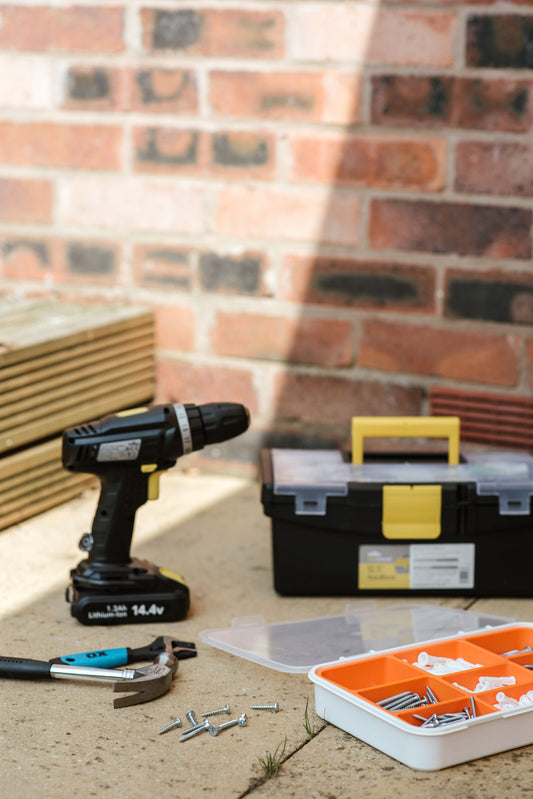 Home repair toolbox with drill and hand tools