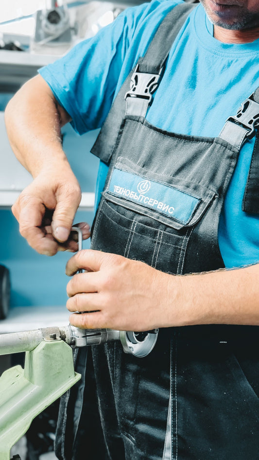 Plumber repairing a residential pipe